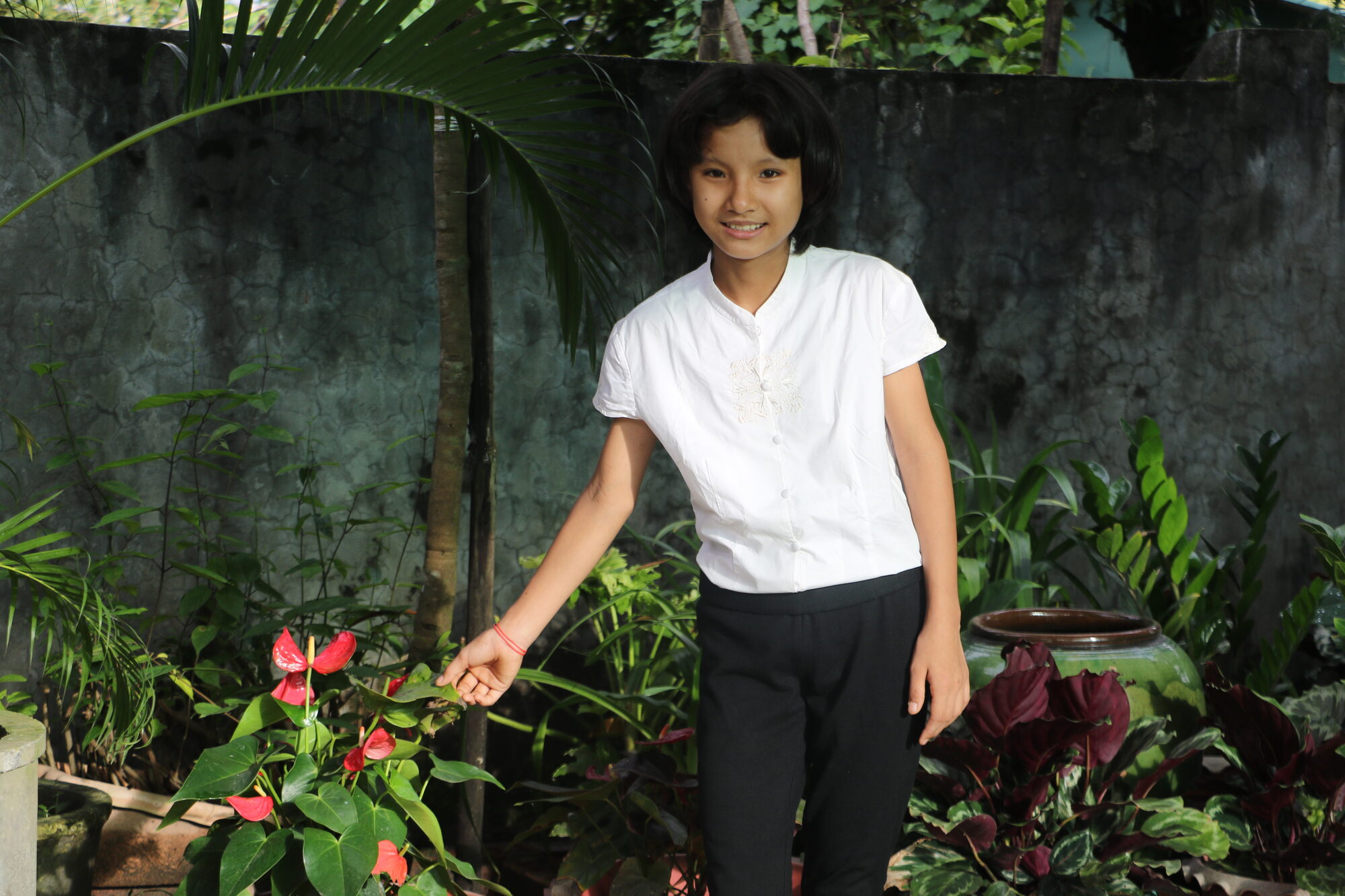Young woman supported by Light of Burma